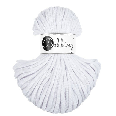 A skein of white bobbiny braided cord with a white paper label that reads 'Bobbiny' in black script and logo, set against a plain white background.