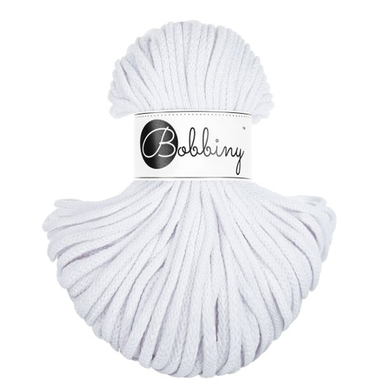 A skein of white bobbiny braided cord with a white paper label that reads 'Bobbiny' in black script and logo, set against a plain white background.