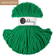 A skein of bright green braidedcord with a white paper label reading 'Bobbiny' in black script, shown on a plain white background with a small 'LIMITED EDITION' banner in the top left corner.