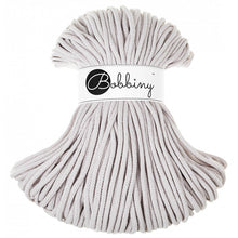 A skein of light grey, silver braided cord with 'Bobbiny' label on a white background