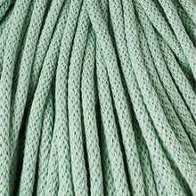 A close-up of aloe green braided cord  filling the frame, showing the woven texture and repeating strands.