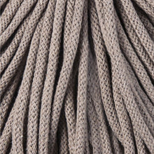 A close-up of a braided cord in a warm coffee color, showing the texture and weave pattern.