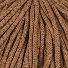 A close-up of 5mm braided rope or cord in a warm medium brown color, filling the entire frame.