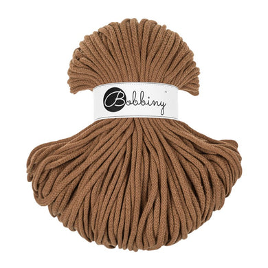 Caramel  skein with a Bobbiny label on a white background