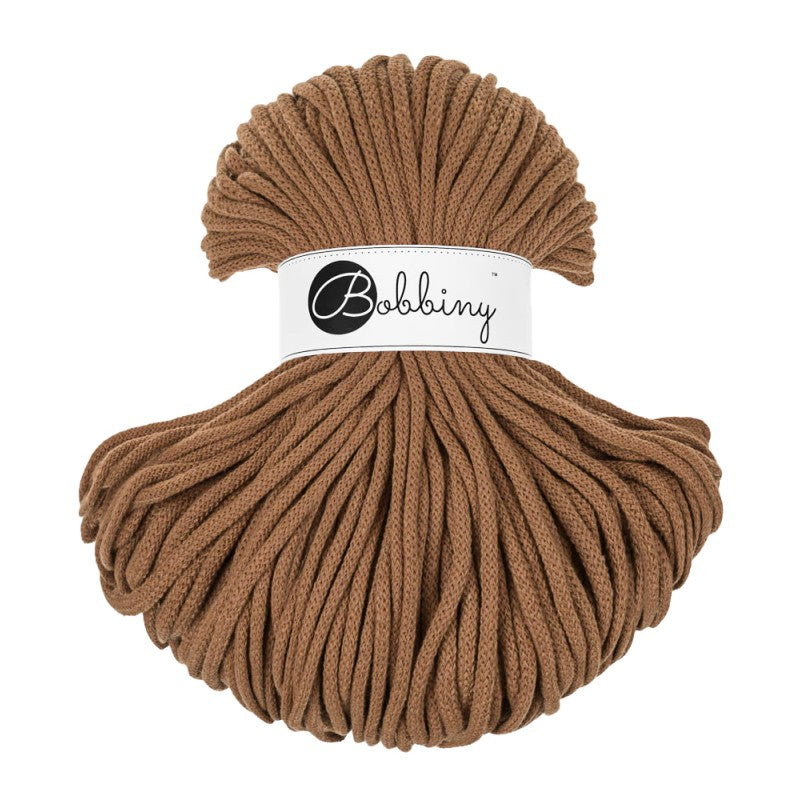 Caramel  skein with a Bobbiny label on a white background
