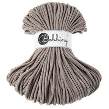 A bundle of thick coffee cord wrapped with a white paper band labeled 'Bobbiny' in black script, set against a plain white background.