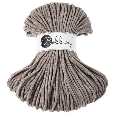 A bundle of thick coffee cord wrapped with a white paper band labeled 'Bobbiny' in black script, set against a plain white background.