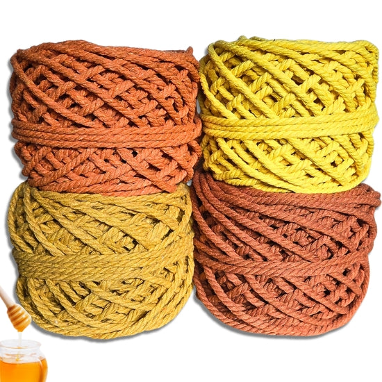 Four 5mm rope bundles in orange, yellow, and mustard tones arranged in a 2x2 grid on a white background, with a small honey jar and dipper visible in the lower left corner.
