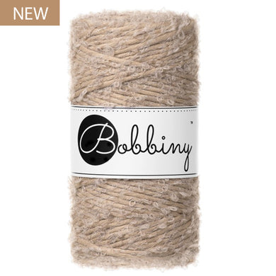 New Bobbiny 3mm Sand Boucle Cord 100m in a soft sandy beige shade, with Bobbiny label and NEW product badge.
